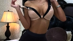 Busty curly brunette with big boobs fucks on couch