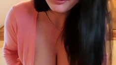Busty curly brunette with big boobs fucks on couch