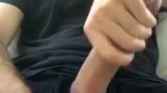 Muscular amateur strokes his big hard cock with a thick bell