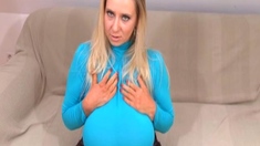 Blonde mature with big boobs masturbates in bed