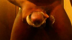 Sexy black dude soaps and strokes his massive shaft for the camera