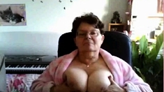 naughty granny flashing her big tits on cam