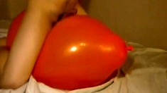 Big inflatable orange balloon humping cum